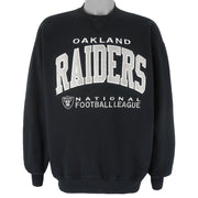 NFL (Russell Athletic) - Oakland Raiders Big Logo Crew Neck Sweatshirt 1990s X-Large Vintage Retro Football