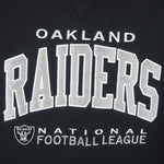 NFL (Russell Athletic) - Oakland Raiders Big Logo Crew Neck Sweatshirt 1990s X-Large Vintage Retro Football