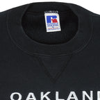 NFL (Russell Athletic) - Oakland Raiders Big Logo Crew Neck Sweatshirt 1990s X-Large Vintage Retro Football