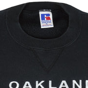 NFL (Russell Athletic) - Oakland Raiders Big Logo Crew Neck Sweatshirt 1990s X-Large Vintage Retro Football