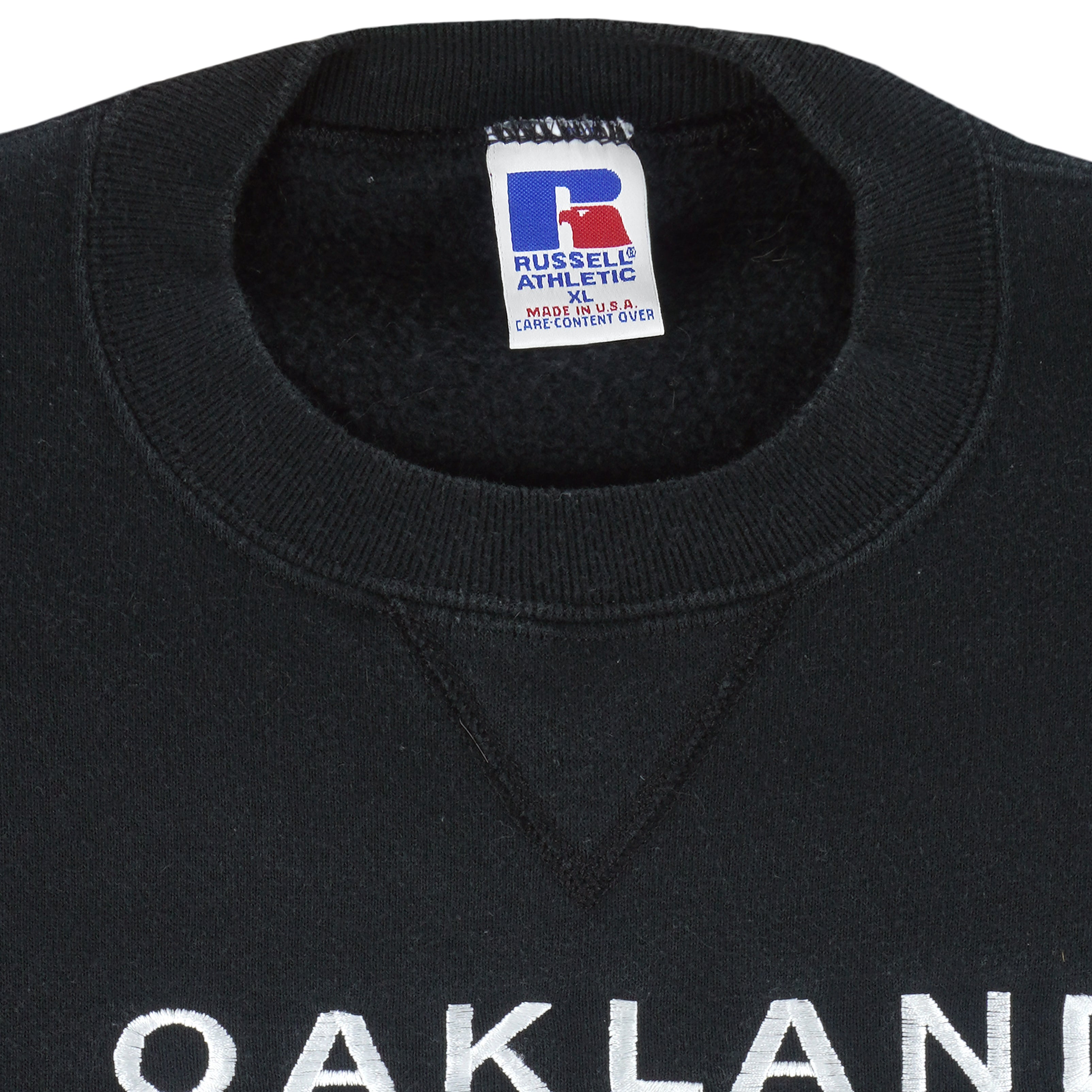 NFL (Russell Athletic) - Oakland Raiders Big Logo Crew Neck Sweatshirt 1990s X-Large Vintage Retro Football