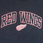 NHL (Gildan) - Detroit Red Wings Spell-Out T-Shirt 1990s X-Large Vintage Hockey