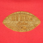 New Mexico Lobos embroidered football-shaped chest logo detail