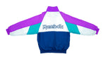 Reebok - Blue & Purple & White Spell-Out Windbreaker 1990s Medium Vintage Retro