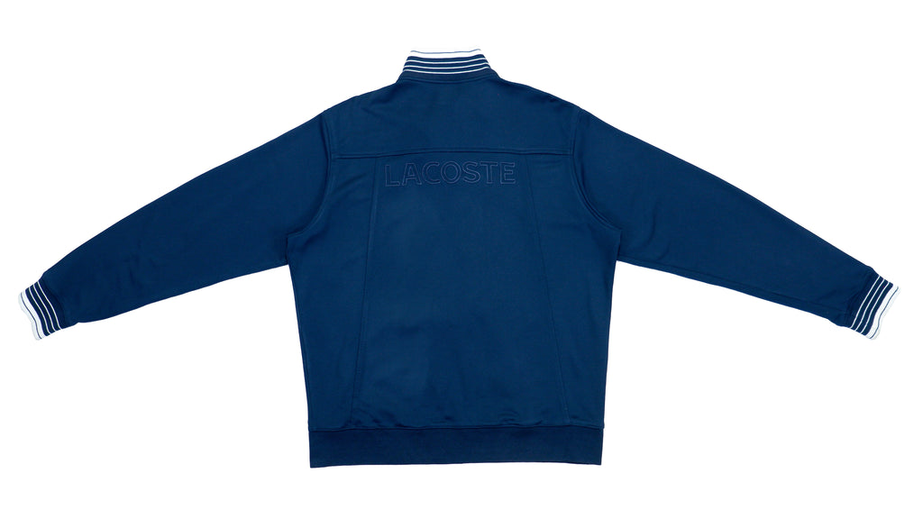 Lacoste - Navy Blue Spell-Out Track Jacket 1990s Large Vintage Retro